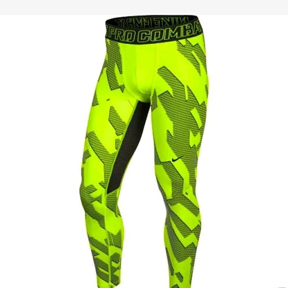 Тайтсы Nike Pro мужские желтые